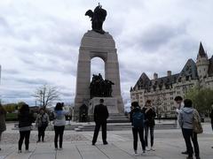 National War Memorial in Canada with the main granite arch and bronze sculptures of soldiers