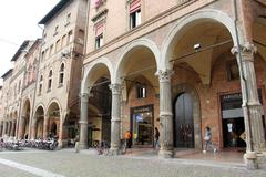 Piazza Santo Stefano in Bologna with historic buildings and statue of Luigi Galvani