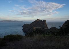 Point Bonita Lighthouse with rocky coastline and ocean