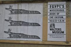 Detail of the wall on Centre Street featuring images from Egypt's Mysterious Book of the Faiyum