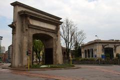 Porta Romana in Milan viewed from the front with multiple people walking