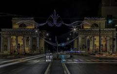 Photo of Porta Venezia monument illuminated at night in Milan, Italy