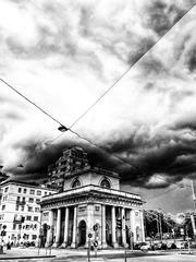 Stormy skies over Porta Venezia monument in Italy