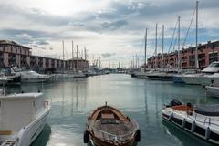 Panoramic view of Genoa, Italy showcasing its coastal landscape, historic buildings, and vibrant harbor