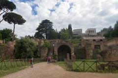 Trajan's Forum in Rome with ancient ruins and tall columns under a clear sky