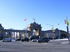 Canadian National Exhibition in Toronto featuring crowds of people, rides, and food stalls