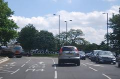 A4, Bath Rd with cars and trees lining the road