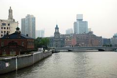 View of Suzhou Creek from Garden Bridge with General Post Office of Shanghai centered