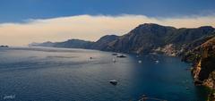 Sunset Over Amalfi Coast with Boats and Harbor