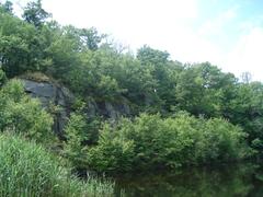 Water-filled quarry at Quincy Quarries Reservation in Quincy, Massachusetts