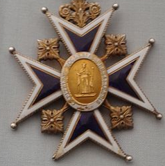 close-up of the canons' cross of Versailles