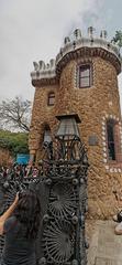 Parc Güell entrance in Barcelona featuring the vibrant mosaic work