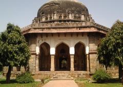 Beautiful lush green garden with old era monuments