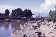 A historical photograph of a bridge over the Jelhum river in Srinagar, Kashmir (1969).