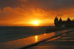 Belém Tower at sunset with dramatic cloudy sky, Lisbon, Portugal