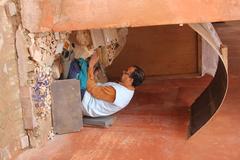 Craftsman making mosaics for the restoration of Sadian Tombs in Marrakech