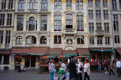 Grand Place in Brussels with historic buildings and tourists