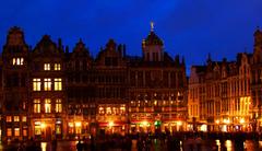 Grand Place of Brussels at twilight with illuminated buildings