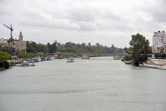 Puente de Isabel II connecting Triana and Center City in Seville with Torre del Oro on the left