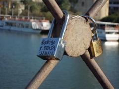 Love padlocks on the San Telmo Bridge in Sevilla