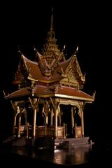 illuminated Thai pavilion at night