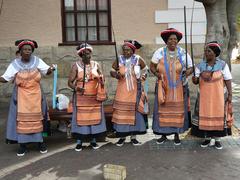 Xhosa women in traditional costumes and face paintings