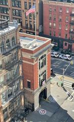 High angle photo of Firehouse, Hook & Ladder Company 8 with Ghostbusters logo in NYC