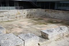 Freshwater pool in front of ancient city walls of Marseille