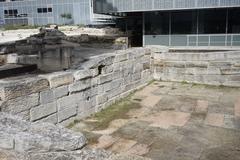 Freshwater pool in front of ancient city walls of Marseille