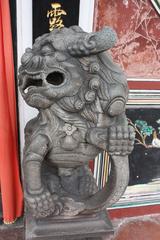 Stone statue guarding Cheng Hoon Teng temple