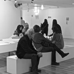 visitor pausing at an art exhibit in Berardo Collection, Lisbon