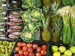 colorful display of fruits and vegetables at a market stall