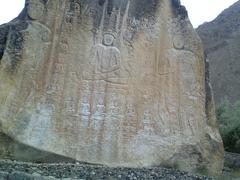 Giant Buddha statue carved into rock in Pakistan