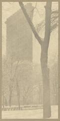 black and white photograph of the Flatiron Building in New York City by Alfred Stieglitz