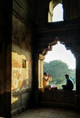 Flautist and student practicing at Shisha Gumbad in Lodi Gardens