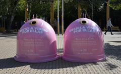 Glass containers representing a woman's breast during Breast Cancer Awareness Month 2019 in Seville