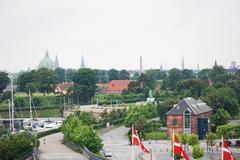 View from a docked cruise ship at Langelinie in Copenhagen with Kastellet and Marble Church dome