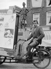 Robert Jasper Grootveld with Aat Veldhoen drawings on a bakfiets