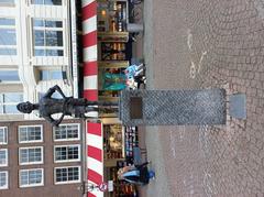 Amsterdams Lieverdje on Spui Square, Amsterdam before it was knocked over in 2024.