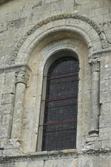 Romanesque arched window of St-Pierre Church in Aulnay