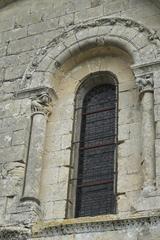 Romanesque arched window of St-Pierre Church in Aulnay