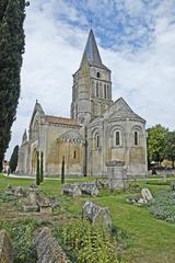 St-Pierre d'Aulnay church viewed from the northeast showing the apse, transept, and crossing tower