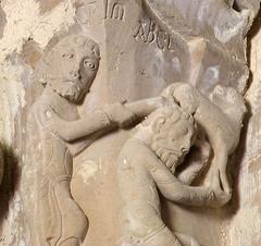 Cain kills Abel sculpture at the southwest crossing of the transept