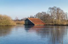 boat house in low moorland marshes of De Deelen