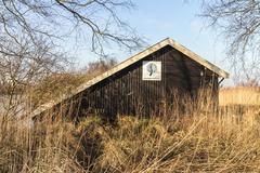 Boat house of state forestry in low moorland marshes