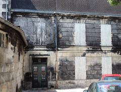 Black mold on the walls of Otard cellars in Cognac, France