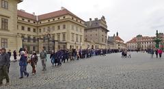 Queue of people waiting to enter St. Vitus Cathedral at Hradcany Square