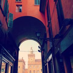 Access to Piazza Maggiore from Via delle Pescherie Vecchie in Italy