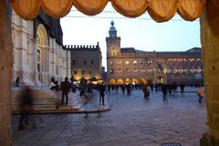 Palazzo d'Accursio seen from under a portico