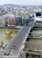 Bridge over the Seine River with trees along the Allée des Cygnes